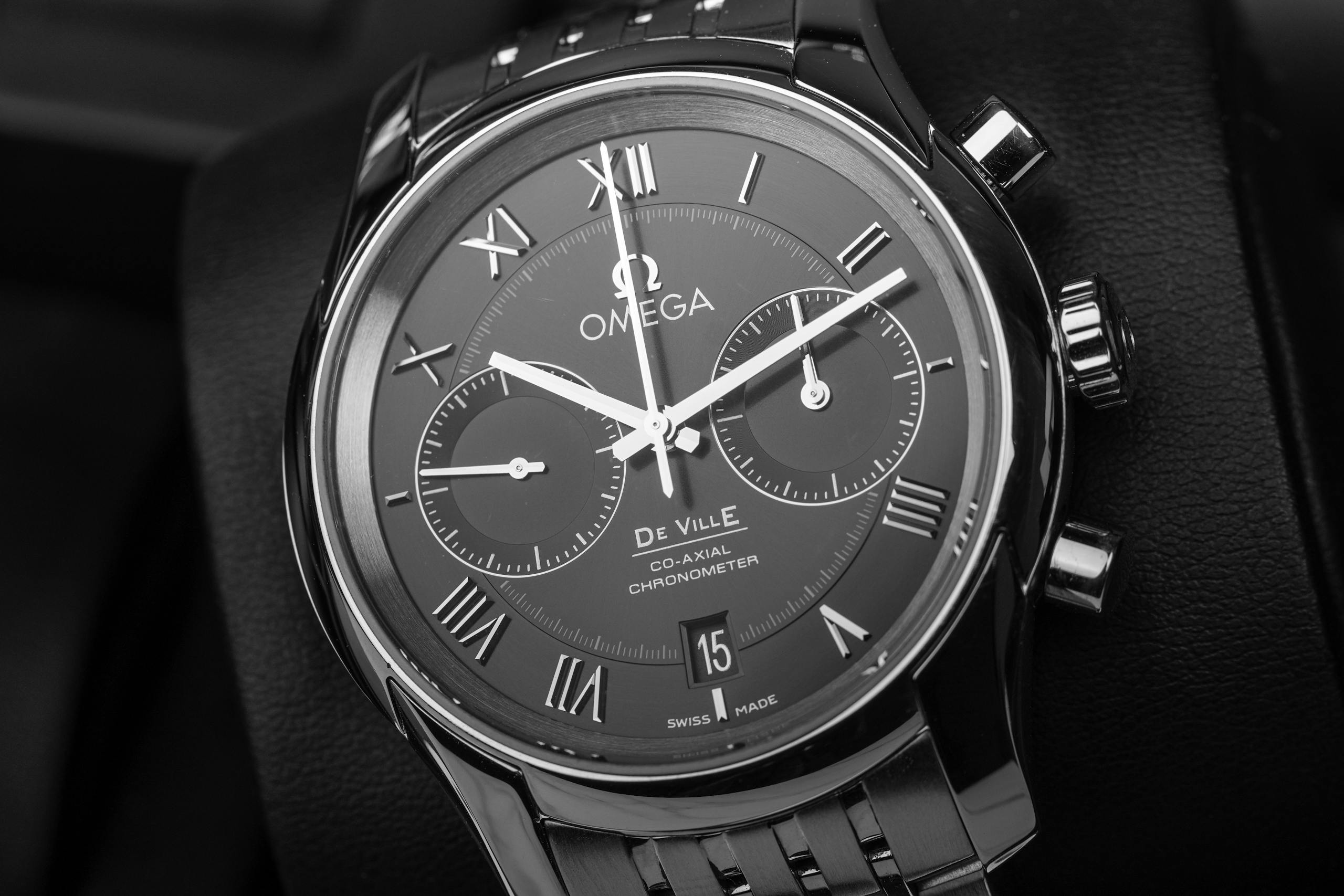 Elegant black and white close-up of a luxury wristwatch. Perfect for timepiece enthusiasts.
